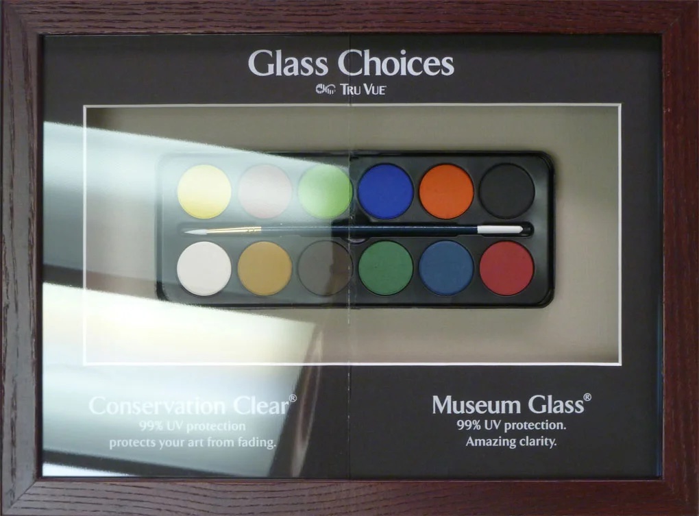 A display comparing Tru Vue Conservation Clear and Museum Glass, both offering 99 percent UV protection